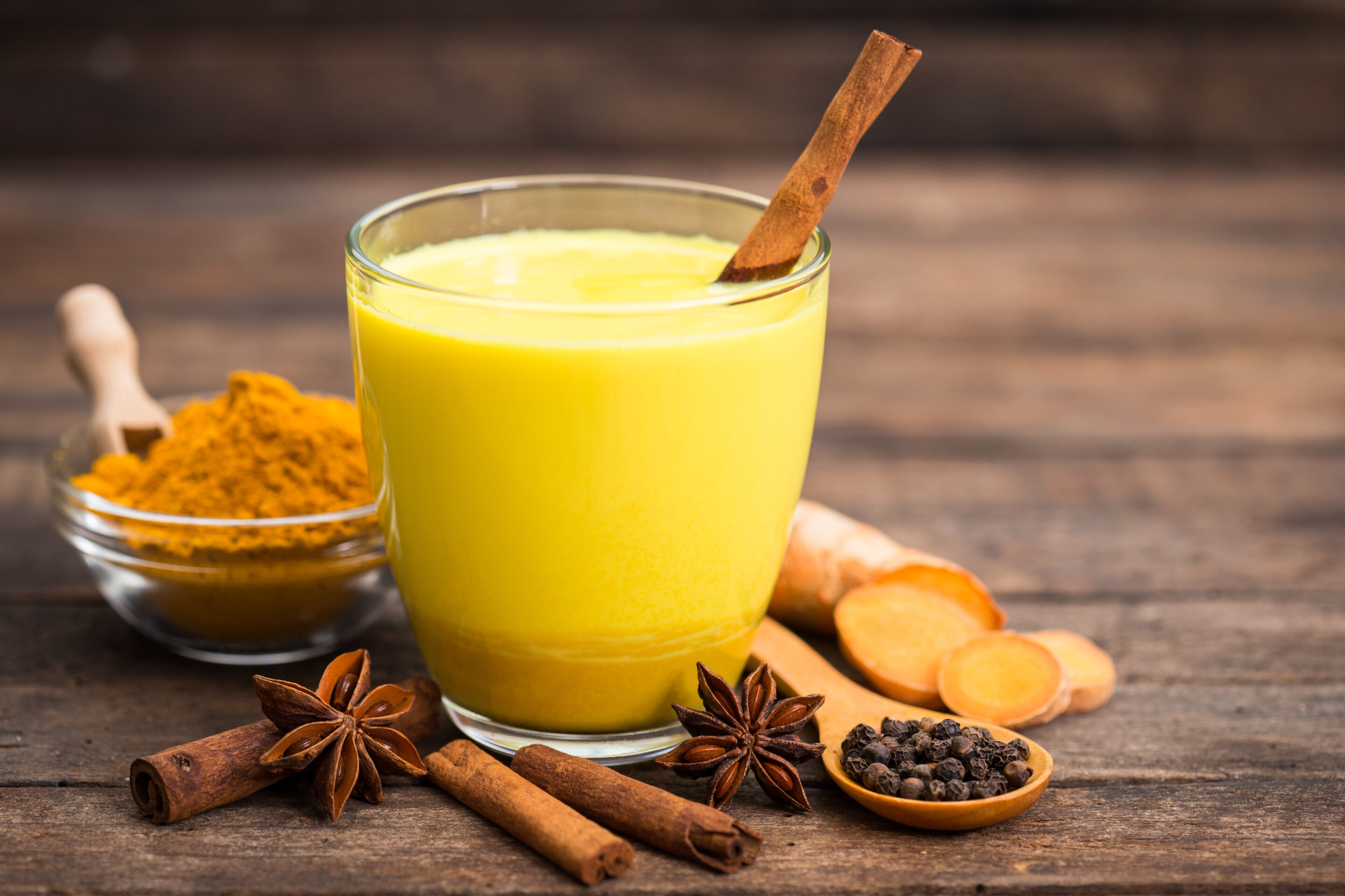 Turmeric golden milk latte with honey and cinnamon